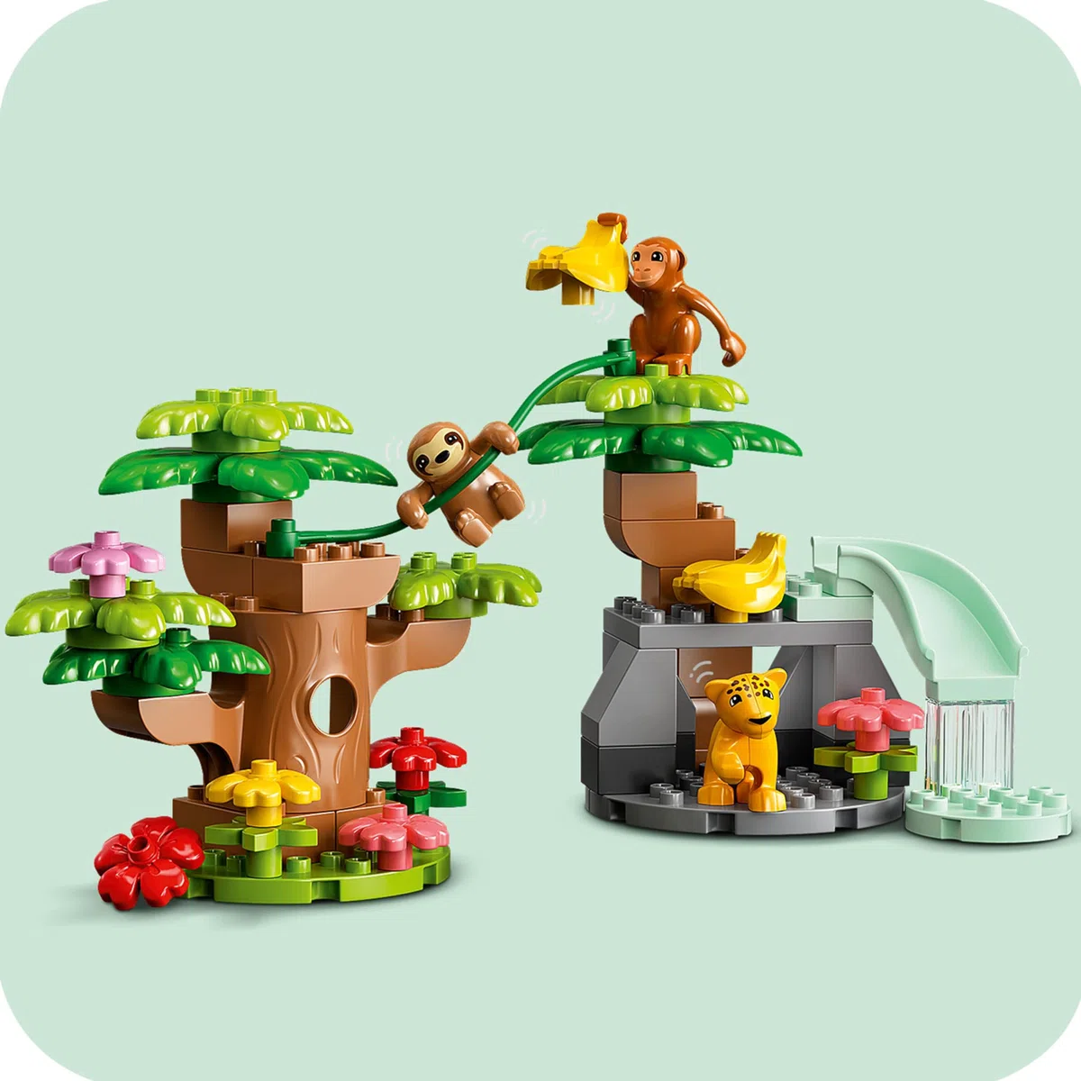 LEGO 10973 DUPLO Wilde Tiere Südamerikas Spielzeug-Set mit 7 Tierfiguren, Steine und Dschungel-Spielmatte, Lernspielzeug ab 2 Jahre